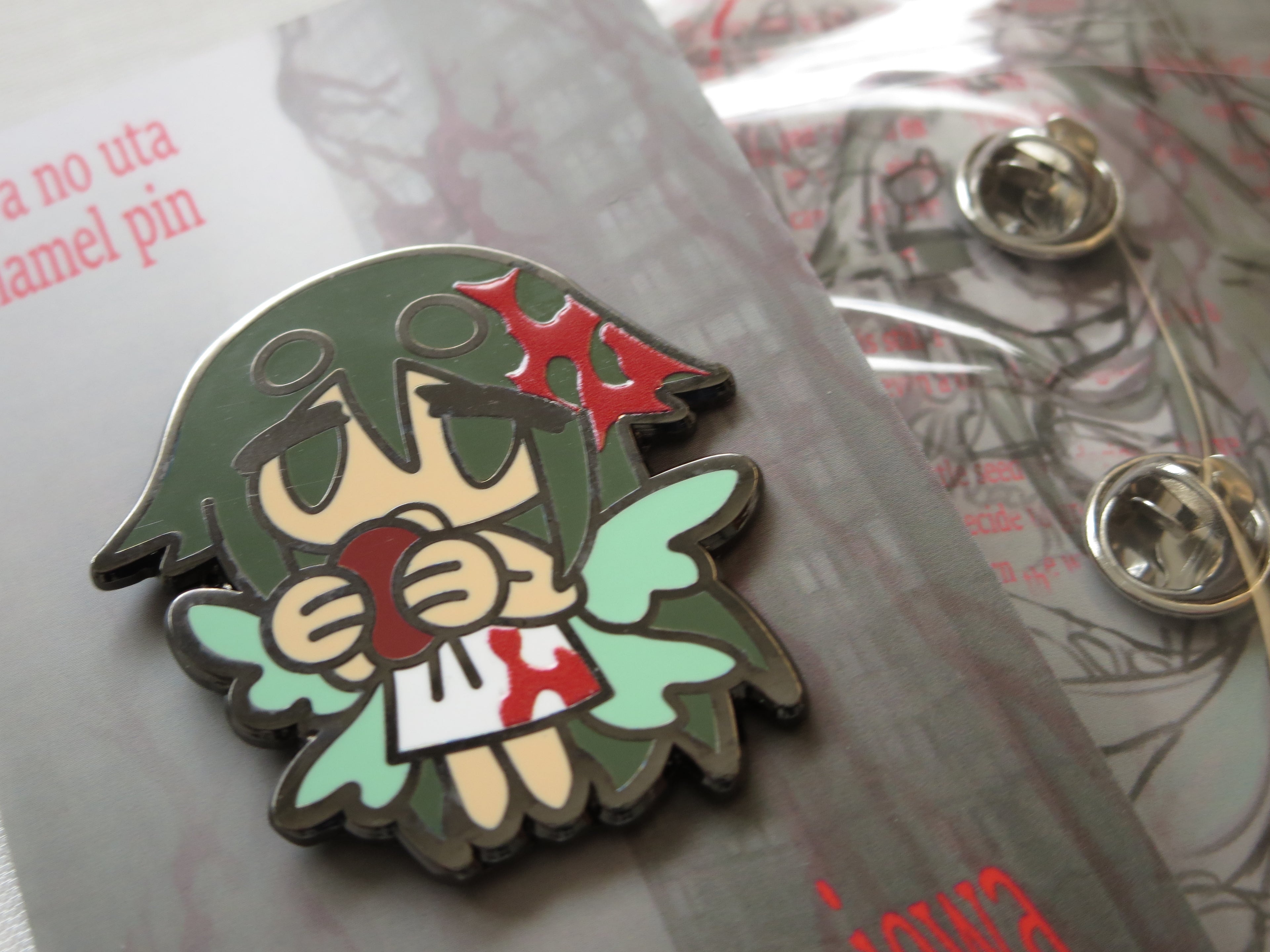 saya no uta enamel pin