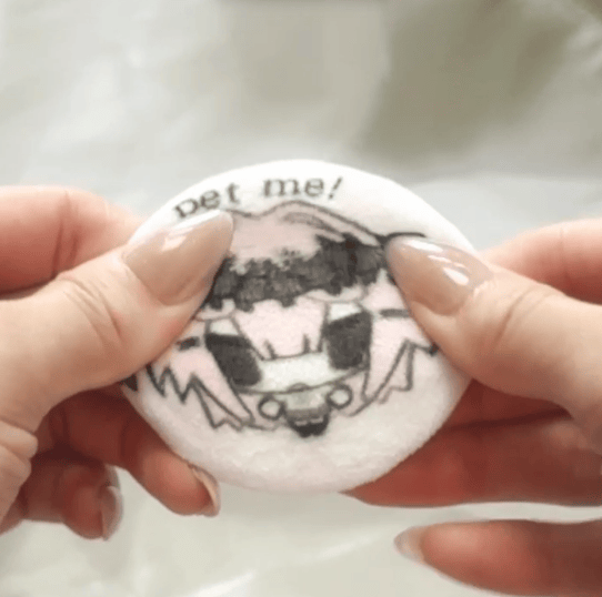 pet me cushion badge